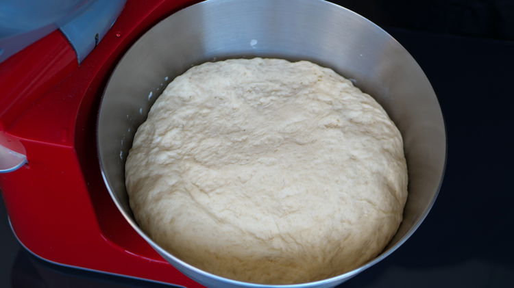 Image of Add dough into an oiled bowl, cover and rest for...
