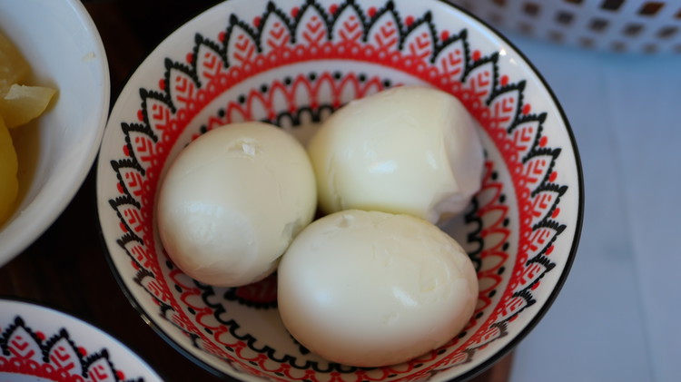 Image of Boil eggs until hard boiled. Dice eggs and set aside. 