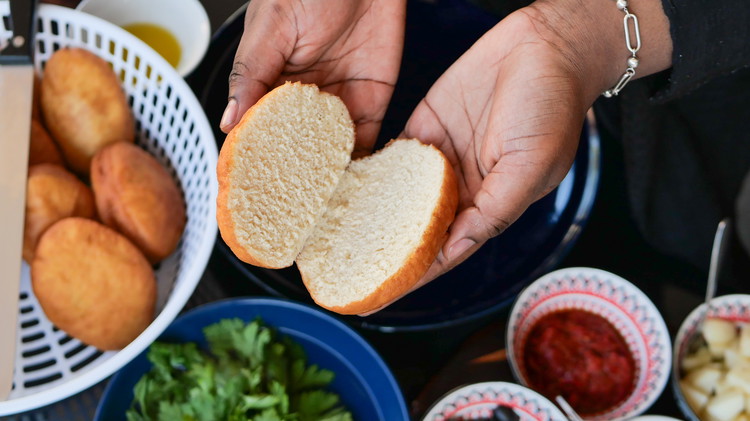 Image of Spread harissa paste on both sides of the bun.