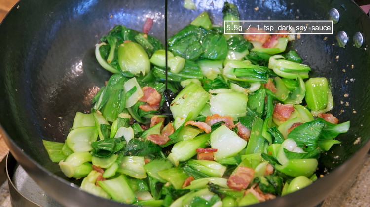 Image of Toss in the bok choy leaves and mix until the greens are wilted. Season it with 1 tsp of soy sauce and 1 tsp of dark soy sauce. Don’t put too much because bacon is salty already. However, every brand...