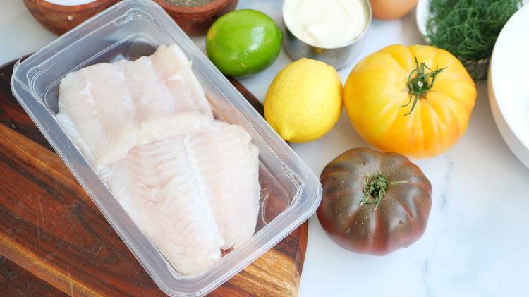 Image of Pat the basa fillets dry and cut them into burger-sized...