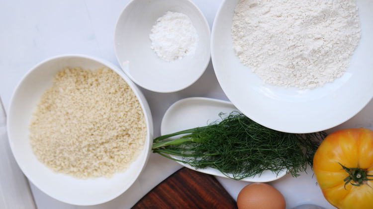 Image of Add panko breadcrumbs to a bowl. Whole eggs to another...