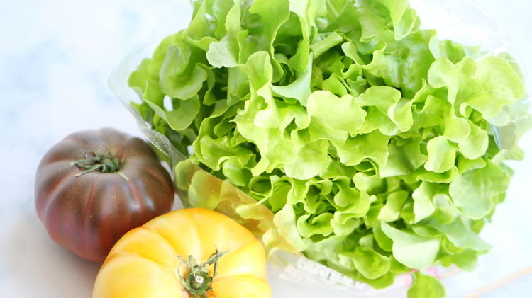 Image of Add lettuce, tomato slices, and the crispy basa fillet.