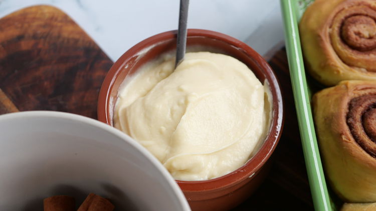 Image of Add the powdered sugar and vanilla, mixing until creamy. Thin...