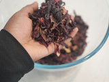 Image of Wash hibiscus flowers with cold water and strain