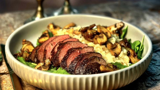 Image of Wild duck breast fillet, risotto with forest mushrooms and parmesan.