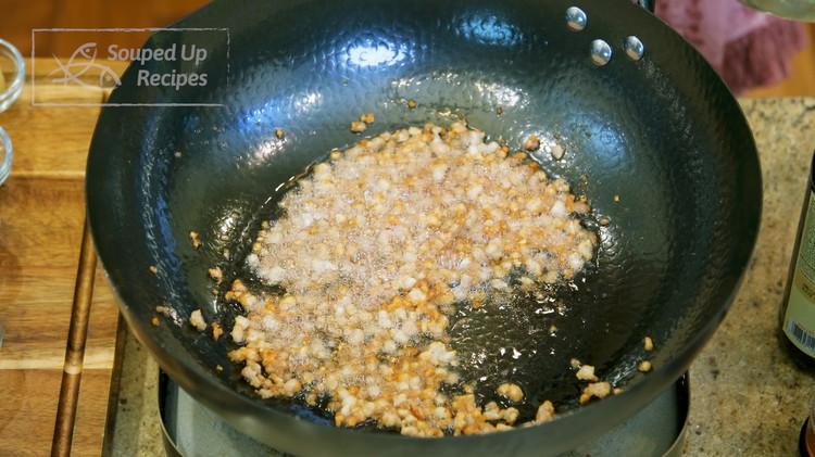 Image of In a few minutes, you should get 2-3 Tbsps of pork fat. Of course, depending on how fatty your pork is, you may not have enough, so you can add some vegetable oil to make up the shortage.
