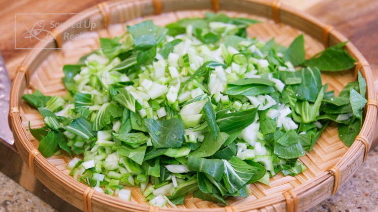 Image of Thoroughly wash the bok choy, and then dice finely. No need to separate the stems and leaves.