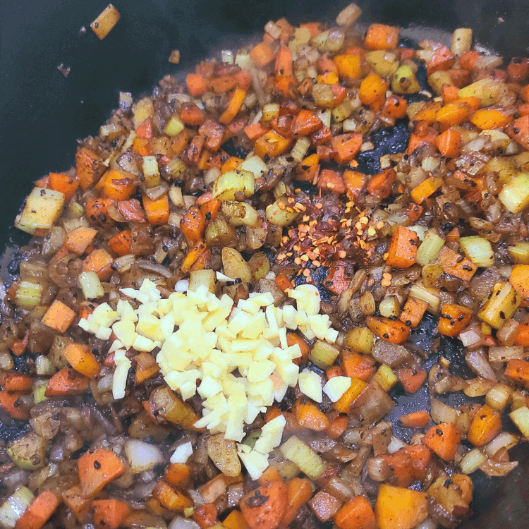 Image of Add the garlic and red pepper flakes and cook until fragrant, about a minute.