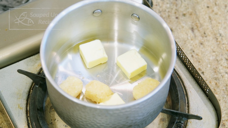 Image of While waiting, make the garlic sauce. Add 3 Tbsps butter and 4 Tbsps finely minced garlic to a saucepan and stir over low heat for 2 minutes. Just a note:  I used frozen minced garlic, which is one of my time-saving...