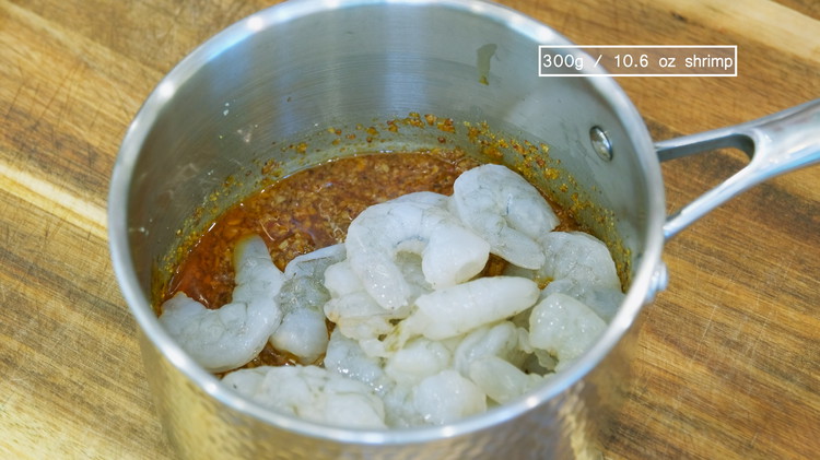 Image of Add 1 Tbsp soy sauce, 1 Tbsp fish sauce, 1/2 Tbsp oyster sauce, and 300g of peeled and deveined shrimp and mix well. Here is an important note. Most shrimp on the market is frozen with a salt solution. If...