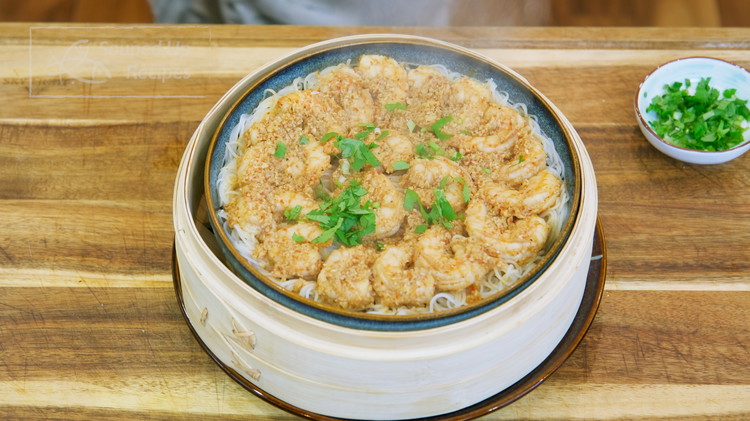 Image of The shrimp should be done cooking by now. Remove the steamer from the pot. The shrimp vermicelli noodles dish is basically done. Just sprinkle some diced cilantro for garnish.
