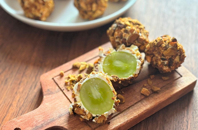Image of Golden Pistachio & Goat Cheese Grape Rounds