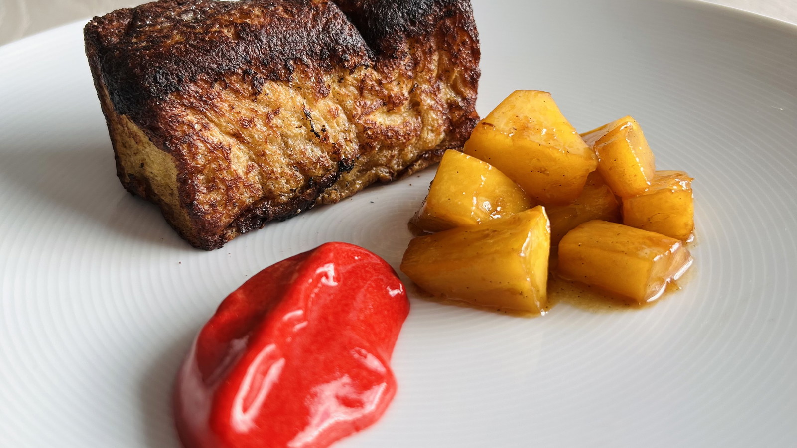 Image of Pain Perdu with Flambéed Pineapple and Raspberry Coulis