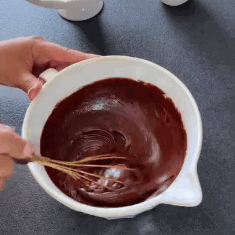 Image of Beat sugar and eggs until frothy. Add the chocolate-butter mix...