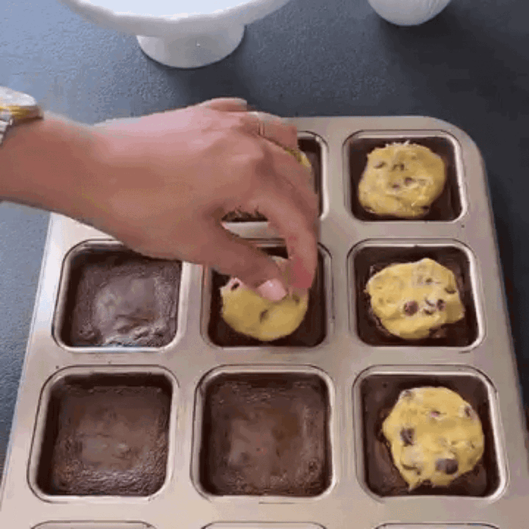 Image of Bake the brownie layer for 5-6 minutes.