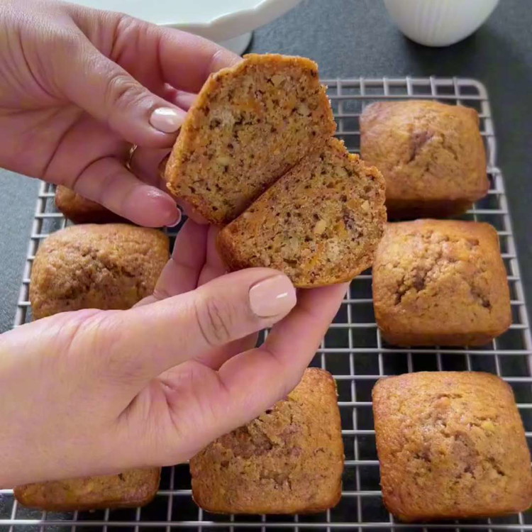 Image of Bake the mini-cakes in the preheated oven for about 20-25 minutes, or until a toothpick inserted into the center of a cake comes out clean