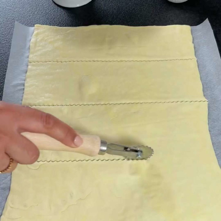 Image of Cut the puff pastry into equal-sized squares, about 8 x 8 cm.