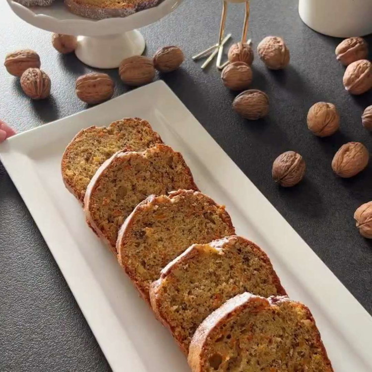 Image of Pour the batter into the prepared loaf pan and smooth the top. Bake for 45–50 minutes. Check doneness with a toothpick.