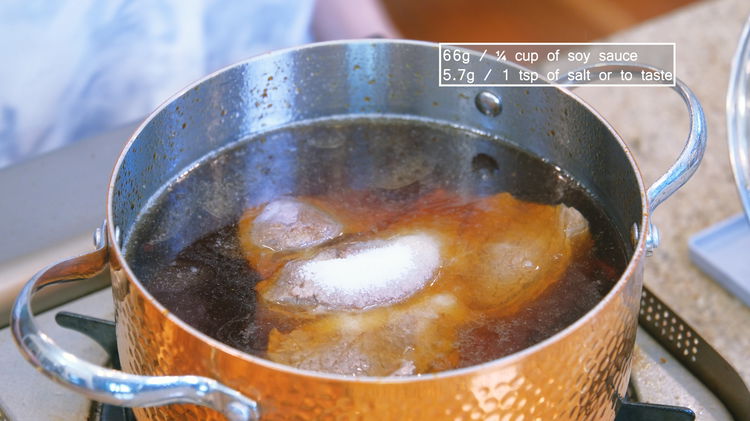 Image of Add the blanched beef, soy sauce, and salt to the...