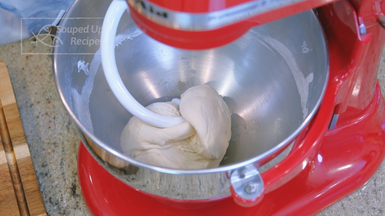 Image of Use the hook attachment and let the stand mixer run over low speed to knead the dough for 8 minutes. If you don't have a stand mixer, knead the dough by hand for 8-10 minutes or until the dough becomes...