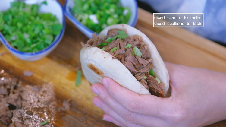 Image of Feel free to sprinkle diced scallions, cilantro, or your favorite chili sauce onto the burger.