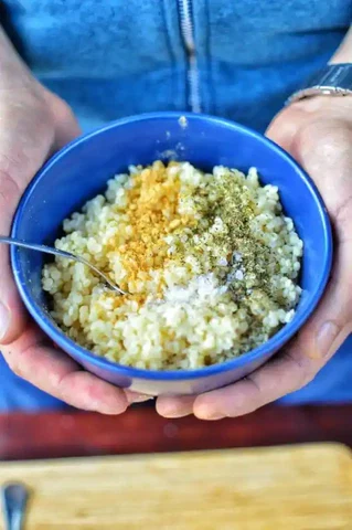 Image of Mix the sweetcorn with the onion, parsley and sesame.