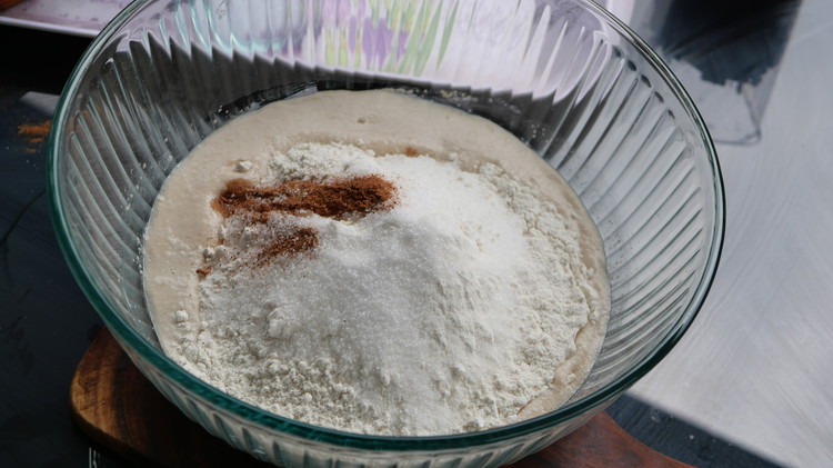 Image of Once the yeast is  activated add the flour, remaining sugar, salt, vanilla essence and nutmeg.