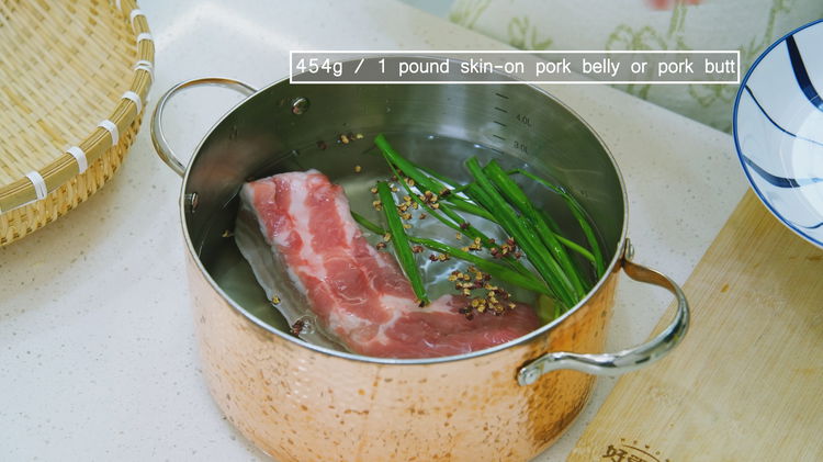 Image of Add water, the pork belly, ginger slices, scallions, Sichuan peppercorns,...
