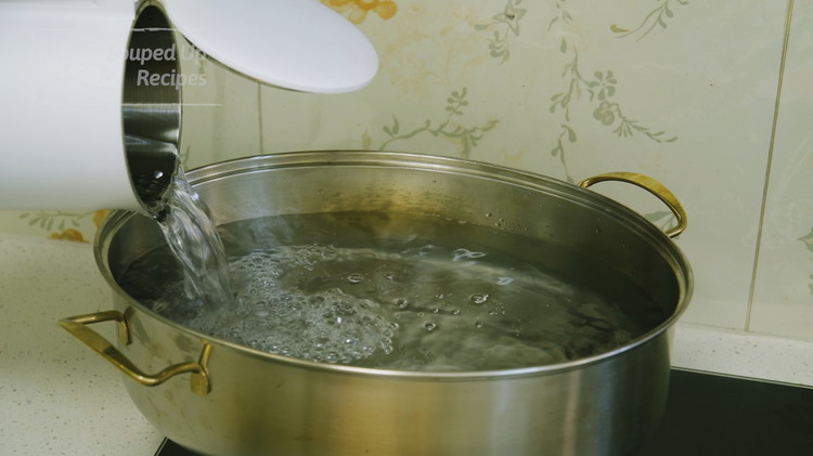 Image of Please use the widest steamer you have so it fits the fish. Fill the steamer with lots of water. Turn the heat to the highest setting and bring the water to a full boil.