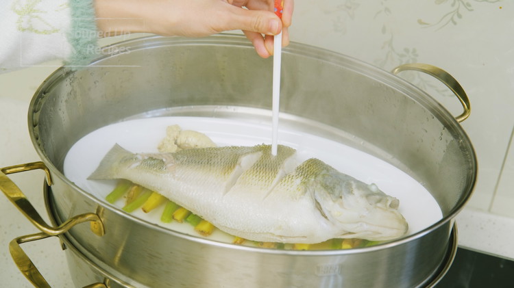 Image of Use a chopstick to poke the thickest part of the fish; if it goes through easily without resistance, it is cooked. You should be skillful enough to understand how long it takes to cook your fish and steam it once...