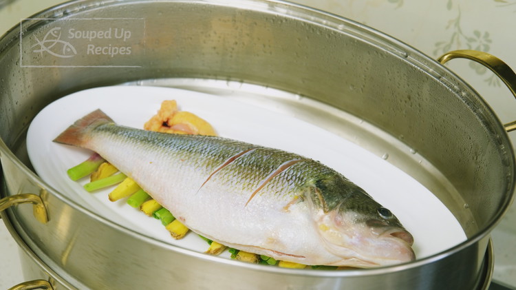 Image of Place the fish and the plate in the steamer and steam over high heat until cooked through; the steaming time depends on the size of the fish. For your reference, a 1.2-pound fish takes 6-8 minutes; 1.4-pound takes 7-9 minutes;...