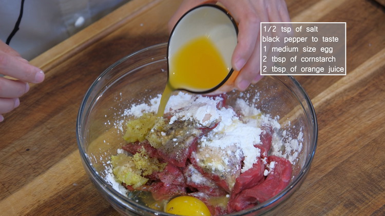 Image of Thoroughly mix the beef with minced garlic, ginger, salt, ground black pepper, 1 medium-size egg, 2 tbsp of cornstarch, and 2 tbsp of freshly squeezed orange juice, which is one of my secrets. Not only does it give a nice...