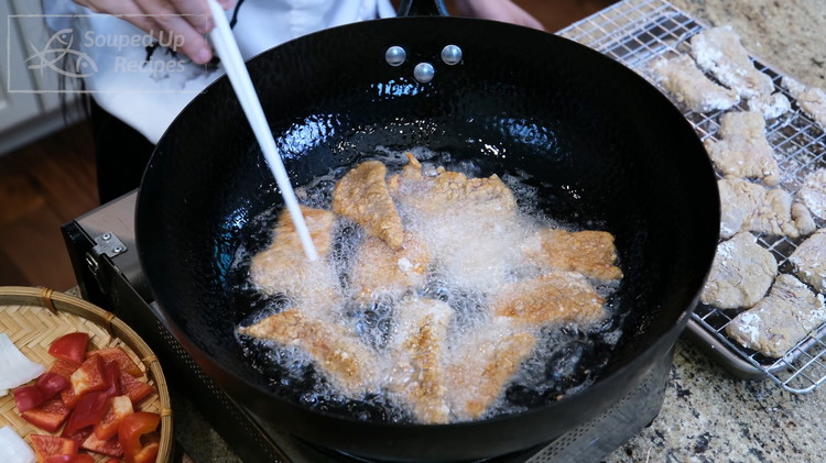 Image of Heat 1 cup of oil in the wok to 400F, add the beef one by one, and fry over high heat for 1 minute per side or until both sides are golden brown. It is best to add the meat...