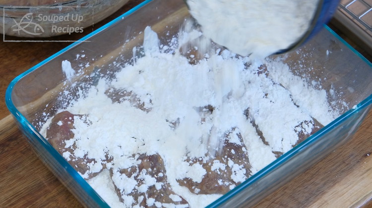 Image of Why add cornstarch to the marinade if you are coating the beef with cornstarch anyway? Well, the first 2 tbsp of cornstarch acts like glue, and it will catch more starch during coating, making a thicker breading.