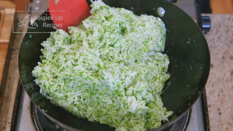 Image of Once the rice is done cooking, fluff the grains and mix with the scallion sauce until you don'tdon't see any white rice.