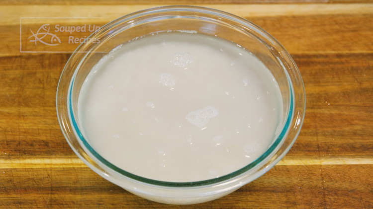 Image of During this time, wash the rice several times, soak it with clean water for 1 hour.