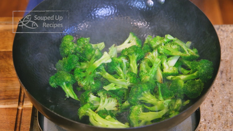 Image of Turn the heat to medium and add the broccoli to the wok. Spread it out and let it toast for a little bit. Toss the broccoli and continue to toast for 3-4 minutes or until slightly charred. This method gives...