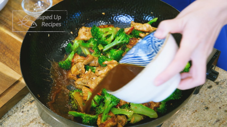 Image of Introduce the broccoli back into the wok. Pour in the sauce and stir well. Serve with white rice.