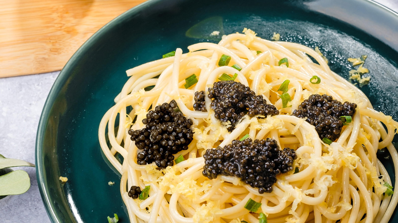 Caviar atop lemon and parmesan pasta