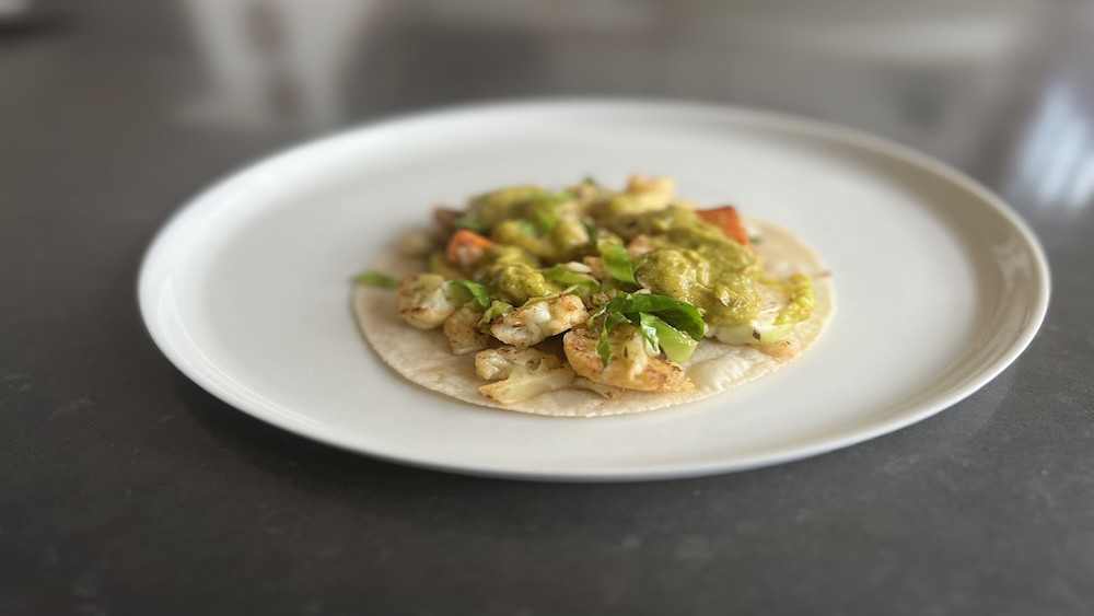 Image of Cauliflower, Sweet Potato and Brussels Sprout Wrap with Green Veggie Sauce