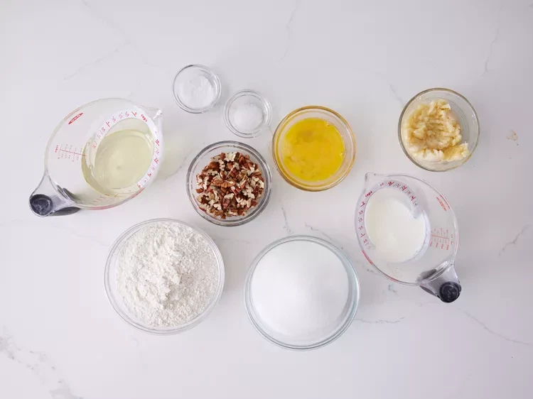 Image of Gather all ingredients. Preheat the oven to 325 degrees F (165 degrees C). Grease a 9x5-inch loaf pan.