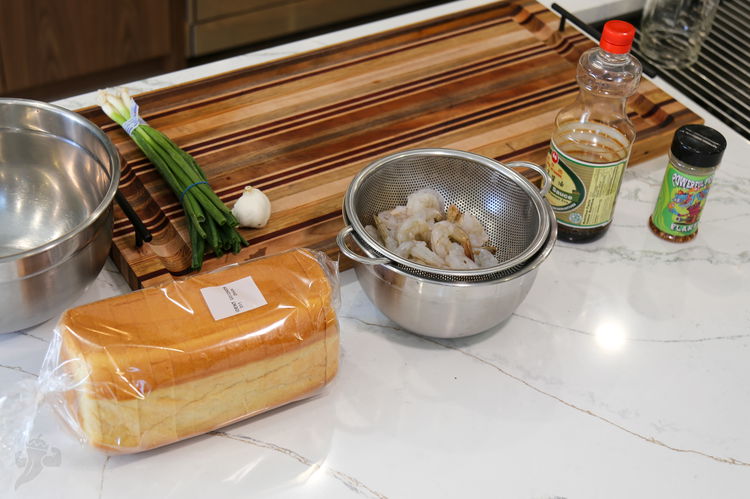 Image of Chop the shrimp until it starts to all stick together,...