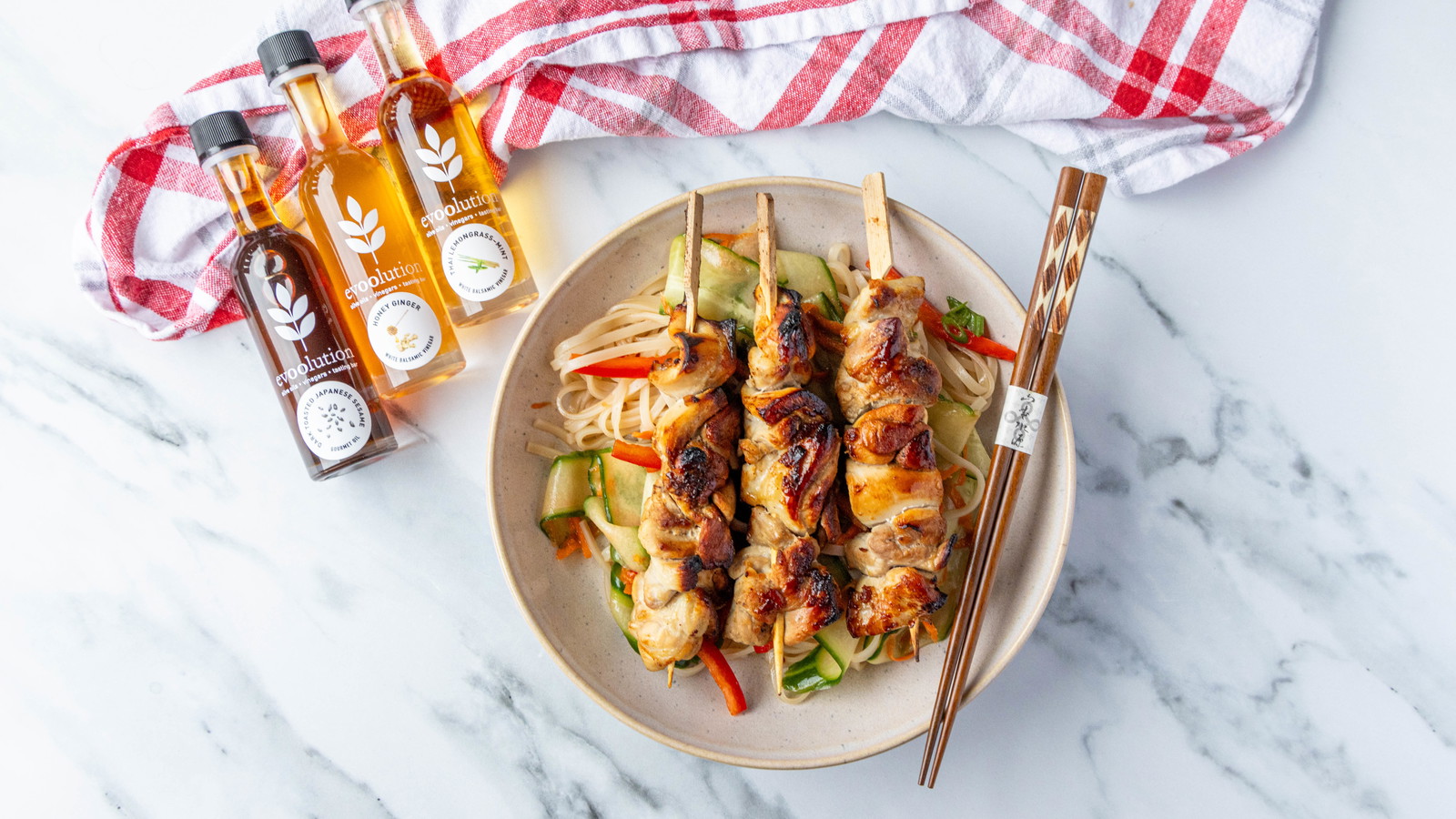 Image of Lemongrass Chicken Skewers and Noodle Salad with Dark Toasted Sesame Oil and Honey Ginger Balsamic