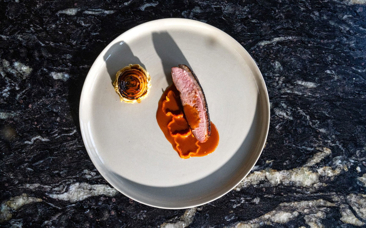 Duck a La Naranja with Grilled Onion Sopes
