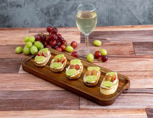 Image of Roasted Super Colossal Garlic and Grape Crostini