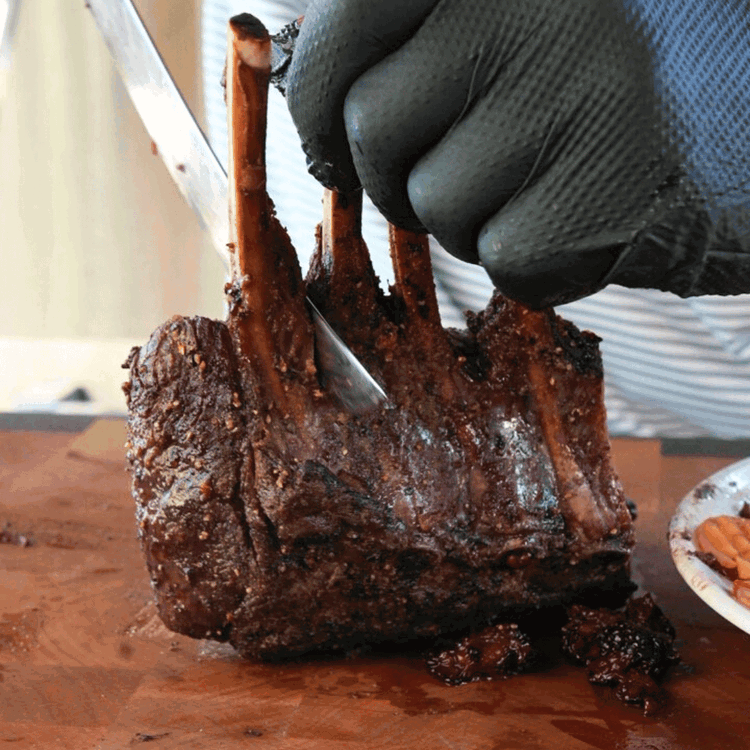 Image of To Serve: Slice rack into chops and drizzle with blackberry...