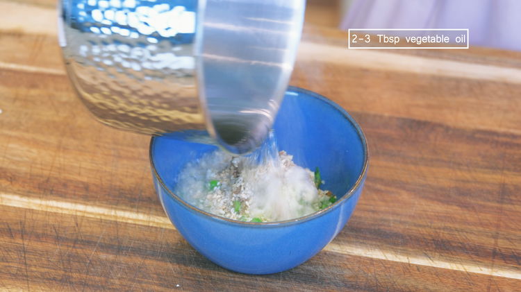 Image of Heat 2.5 Tbsps vegetable oil in a saucepan over medium...