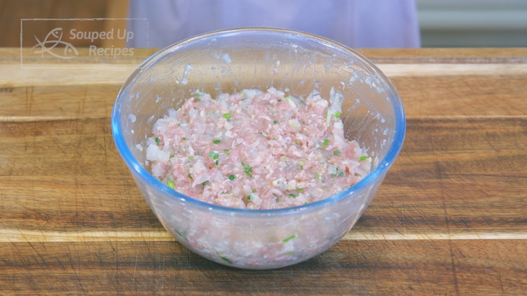 Image of Combine the meat mixture with the minced jelly and mix for 3 minutes until well combined. Cover it and set it in the fridge.