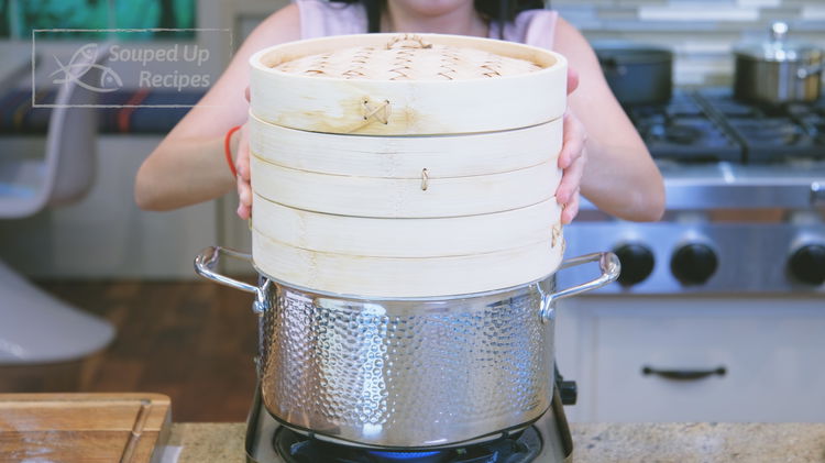 Image of Pre-boil a pot of water and place the steamer above...